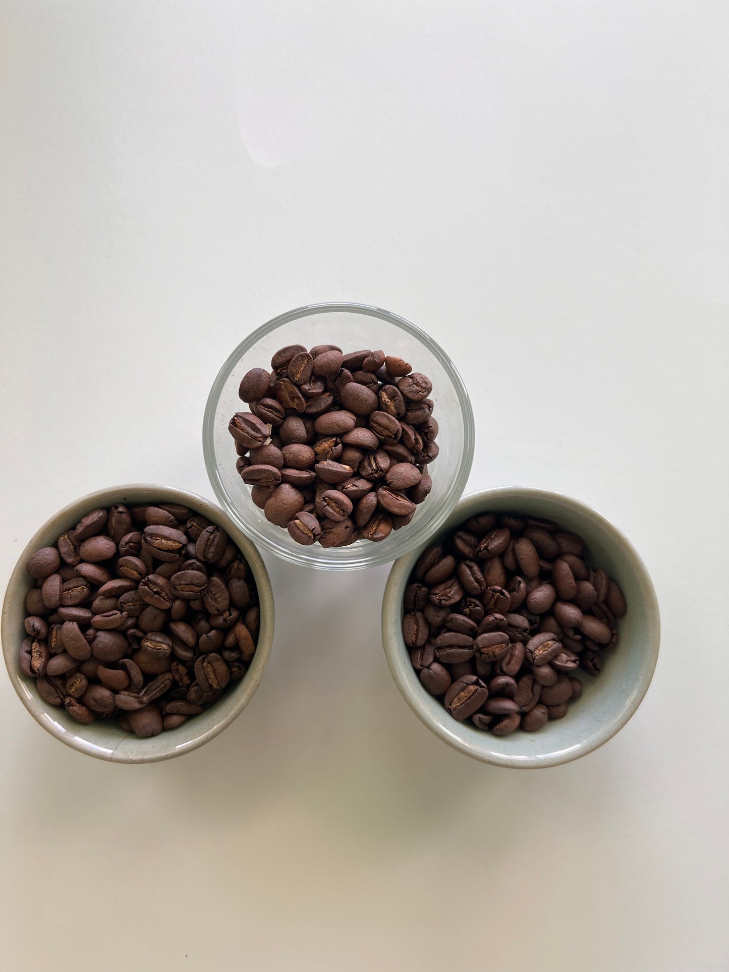 picture of three coffee roasts to achieve with Hog Heaven Coffee  - medium, medium-dark and dark