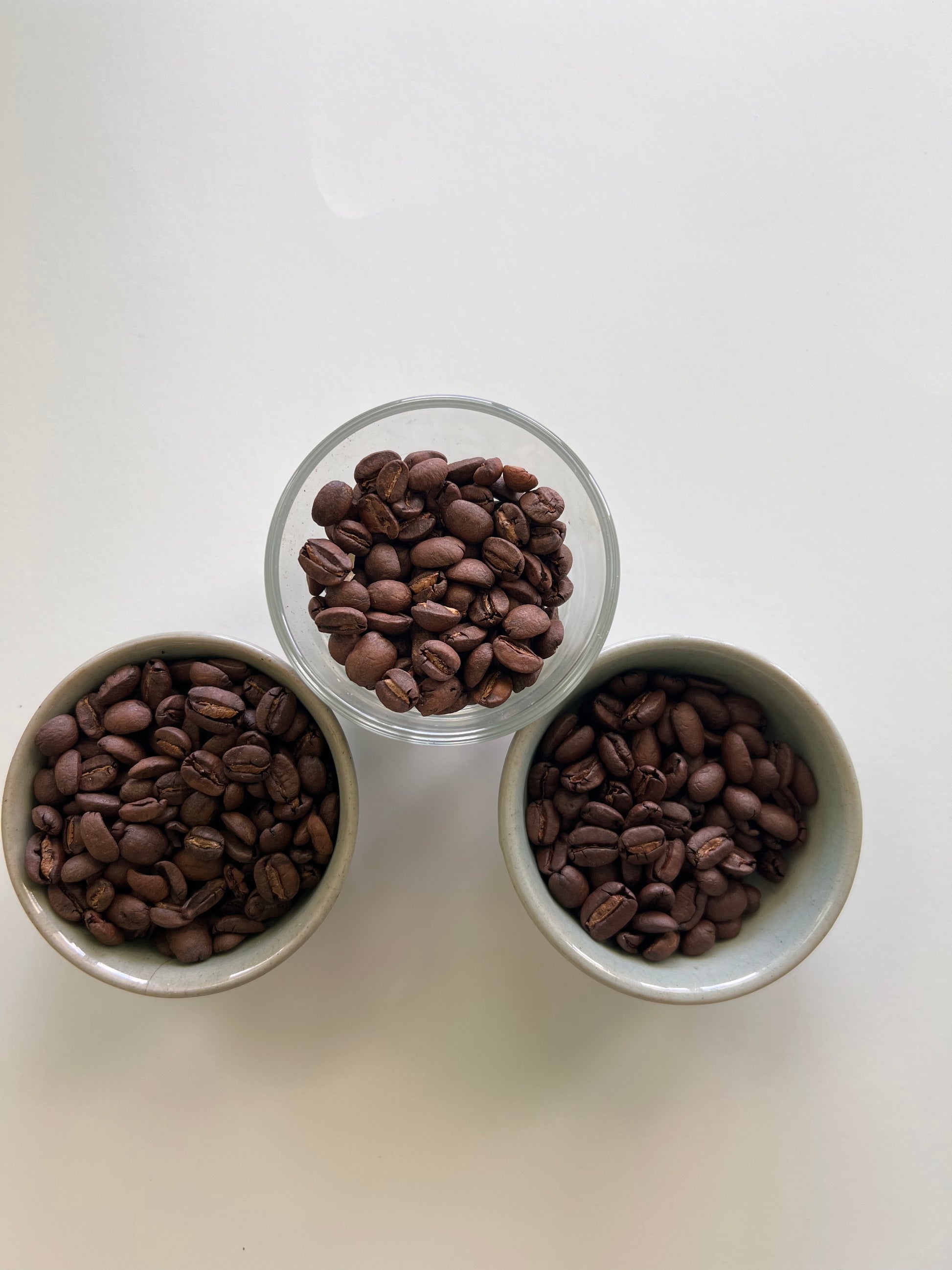 picture of three coffee roasts to achieve with Hog Heaven Coffee  - medium, medium-dark and dark