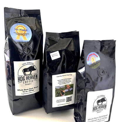Three dark roast coffee bags with 'Hog Heaven Coffee' branding on a white background