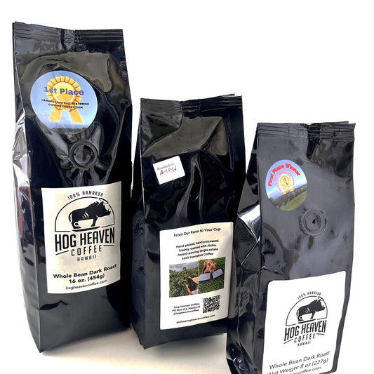 Three dark roast coffee bags with 'Hog Heaven Coffee' branding on a white background
