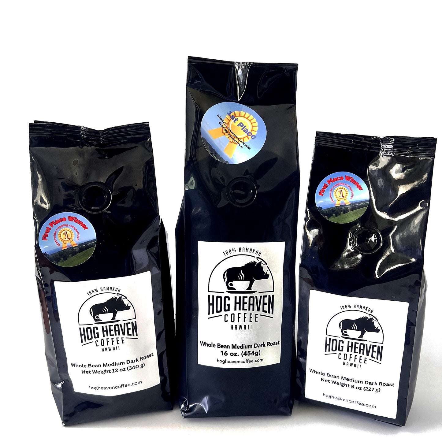 Three medium dark coffee bags with 'Hog Heaven Coffee' labels on a white background